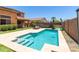 Inviting backyard pool with sun-drenched patio area, ideal for outdoor enjoyment and relaxation at 20784 N Marina Ave, Maricopa, AZ 85139