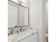 Bathroom featuring marble countertops and gold fixtures at 253 W Malibu Dr, Chandler, AZ 85248