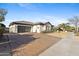 Beautiful home exterior with a spacious driveway and three car garage at 253 W Malibu Dr, Chandler, AZ 85248