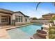 Sparkling pool with tanning deck and water feature, perfect for relaxation at 253 W Malibu Dr, Chandler, AZ 85248