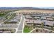 An aerial view of a home in a planned community, showcasing the backyard and surrounding neighborhood at 27366 W Escuda Dr, Buckeye, AZ 85396