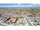 A neighborhood aerial view featuring single Gathering homes with desert landscaping and tile roofs at 27366 W Escuda Dr, Buckeye, AZ 85396