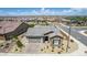 An aerial view of a well-maintained single-Gathering home featuring desert landscaping and a tile roof at 27366 W Escuda Dr, Buckeye, AZ 85396