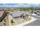 A single Gathering home aerial view in a well-maintained neighborhood with desert landscaping and tile roofs at 27366 W Escuda Dr, Buckeye, AZ 85396