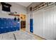 Another view of the unique bedroom with blue locker accents and fun baseball decor at 3095 E Cardinal Ct, Chandler, AZ 85286