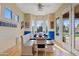 Inviting dining area with bench seating, bright windows, and stylish decor, ideal for Gathering meals and gatherings at 3095 E Cardinal Ct, Chandler, AZ 85286