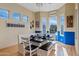 Charming dining area features bench seating, ample natural light, and views of the outdoors for enjoyable meals at 3095 E Cardinal Ct, Chandler, AZ 85286