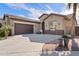 Lovely single-story home with attached garage and a wide concrete driveway at 3095 E Cardinal Ct, Chandler, AZ 85286