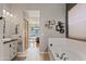 Bright and inviting main bathroom featuring a large soaking tub and views into the main bedroom at 3095 E Cardinal Ct, Chandler, AZ 85286