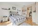 Bright main bedroom with wood floors, modern furniture, and stylish decorative accents at 3095 E Cardinal Ct, Chandler, AZ 85286