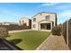 Backyard featuring artificial turf, and a block wall at 38179 W La Paz St, Maricopa, AZ 85138