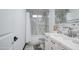 Charming bathroom featuring a marble-tiled shower, modern vanity, and elegant fixtures, creating a spa-like experience at 3915 E Hillery Dr, Phoenix, AZ 85032