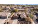 Gorgeous aerial view of a single-Gathering home with desert landscaping and a tile roof in a residential neighborhood at 4109 N Twilight Cir, Mesa, AZ 85207