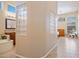 Bathroom area with glass block windows, soaking tub and tiled floors at 4109 N Twilight Cir, Mesa, AZ 85207