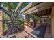 This outdoor exercise area boasts stone columns, weight racks and a heavy bag, perfect for maintaining a healthy lifestyle at 4109 N Twilight Cir, Mesa, AZ 85207