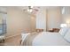 Bright and airy main bedroom featuring neutral colors and a ceiling fan at 4109 N Twilight Cir, Mesa, AZ 85207