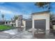 Exterior showcases a modern two-car garage with a stone facade detail on a single-story home at 4132 N 34Th Pl, Phoenix, AZ 85018