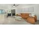 Bright living room featuring sleek tile floors, a stylish couch, and contemporary decor for a modern feel at 4132 N 34Th Pl, Phoenix, AZ 85018