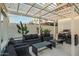 Outdoor living area with comfortable lounge seating under a stylish pergola at 4132 N 34Th Pl, Phoenix, AZ 85018