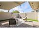 Private patio featuring comfortable seating, brick pavers, and a colorful rug at 4857 N Granite Reef Rd, Scottsdale, AZ 85251