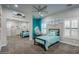 Charming bedroom with stylish decor, including a hanging chair, ocean-themed artwork, and shutters at 5020 E Pershing Ave, Scottsdale, AZ 85254