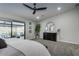 Bright primary bedroom featuring neutral tones, modern furnishings and outdoor access at 5020 E Pershing Ave, Scottsdale, AZ 85254