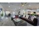 Spacious living room with comfortable seating, modern decor, and a view of the kitchen and dining area at 5020 E Pershing Ave, Scottsdale, AZ 85254