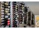 Wine cellar featuring wall-mounted racks filled with wine bottles at 5020 E Pershing Ave, Scottsdale, AZ 85254