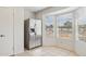 Bright kitchen area with stainless steel appliances and a bay window with exterior views at 510 S Kenwood Ln, Chandler, AZ 85226