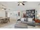 Open floorplan with tile flooring seamlessly connects the living room and kitchen at 510 S Kenwood Ln, Chandler, AZ 85226