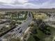 This aerial view captures the lush landscaping and golf course in a well-maintained community at 5450 N Globe Dr, Eloy, AZ 85131