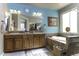 Bathroom featuring double sinks, a soaking tub, and ample storage space, perfect for relaxation at 5450 N Globe Dr, Eloy, AZ 85131