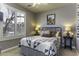 Cozy bedroom featuring a decorative quilt and plantation shutters at 5450 N Globe Dr, Eloy, AZ 85131