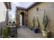 Charming courtyard with stone archway and desert landscaping at 5450 N Globe Dr, Eloy, AZ 85131