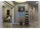 Hallway with eye-catching art and designer decor at 5450 N Globe Dr, Eloy, AZ 85131