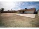 Backyard featuring a large concrete patio area at 5608 W Greenbriar Dr, Glendale, AZ 85308