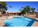 Sparkling pool with inviting lounge area, perfect for relaxation and enjoying the sunny outdoors at 5877 N Granite Reef Rd # 2243, Scottsdale, AZ 85250