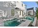 Backyard pool and spa with elegant stone surround, offering a luxurious outdoor experience at 6338 N 10Th Dr, Phoenix, AZ 85013