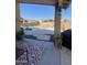 Backyard featuring a covered patio, pool, and landscaped garden, perfect for outdoor living at 6458 W Adobe Dr, Glendale, AZ 85308