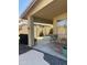 Covered patio area with outdoor seating, providing a relaxing and shaded retreat at 6458 W Adobe Dr, Glendale, AZ 85308