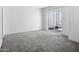 Spacious bedroom featuring a sliding glass door with courtyard access at 7161 E Mcdonald E Dr # 2, Paradise Valley, AZ 85253