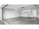 Spacious garage featuring overhead lighting and storage cabinets at 7161 E Mcdonald E Dr # 2, Paradise Valley, AZ 85253