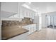 Modern kitchen with white cabinets, granite countertops, and mosaic backsplash at 7161 E Mcdonald E Dr # 2, Paradise Valley, AZ 85253