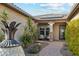 Cozy front porch with charming decor, a seating area, and a welcoming entrance at 7662 W Artemisa Ave, Peoria, AZ 85383