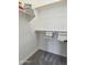 Clean, organized walk-in closet with shelves and hanging rods for optimal storage at 7662 W Artemisa Ave, Peoria, AZ 85383