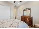 Comfortable bedroom with view of dresser and mirror at 7717 W Noble Prairie Way, Florence, AZ 85132