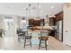 Modern kitchen with a center island and stainless steel appliances at 7717 W Noble Prairie Way, Florence, AZ 85132