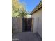 Wooden backyard gate offering access to the property and enhancing privacy and security at 849 W Spur Ave, Gilbert, AZ 85233