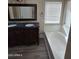 Bathroom with a dual sink vanity and soaking tub at 849 W Spur Ave, Gilbert, AZ 85233