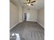 Vaulted bedroom featuring neutral walls, carpet flooring, and a ceiling fan at 849 W Spur Ave, Gilbert, AZ 85233